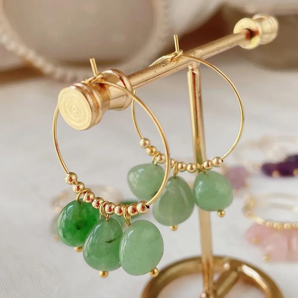 Irregular Green Aventurine Crystal Stone Dangle Hoop Earrings for Women, featuring natural, unpolished green stones on gold hoops.