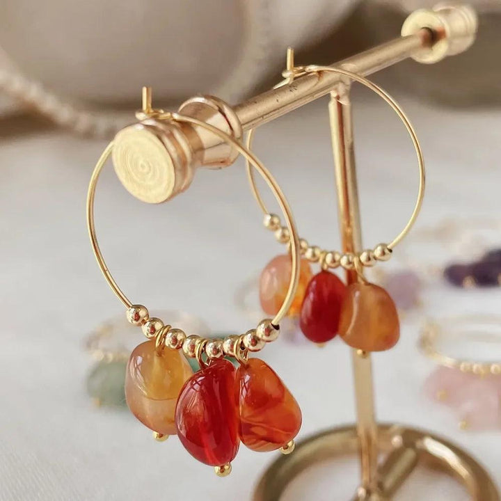 Irregular Red Agate Crystal Stone Dangle Hoop Earrings with gold stainless steel hoops, radiating raw, unpolished energy.