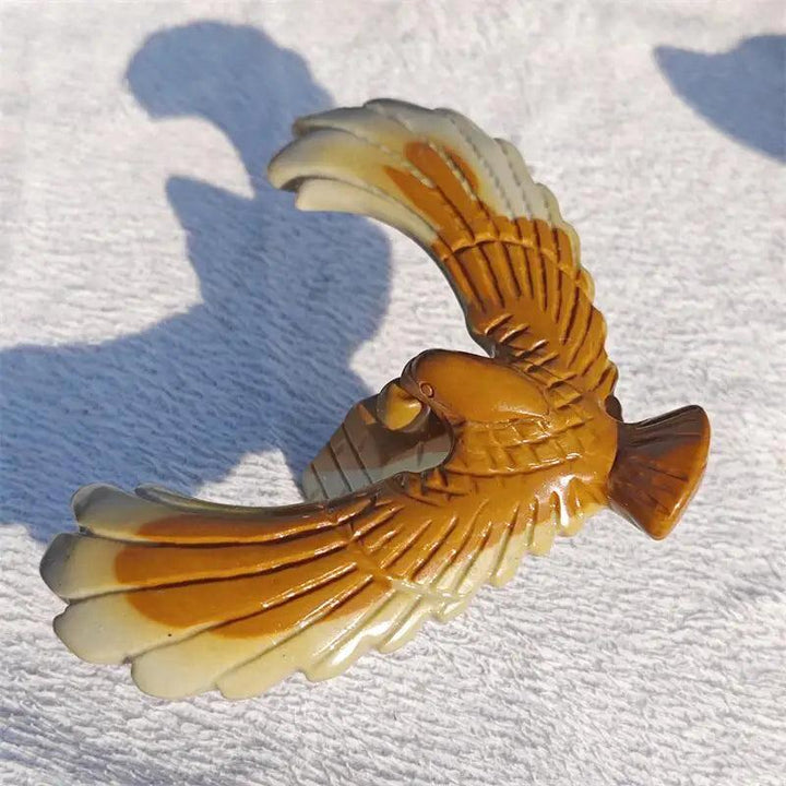 Natural Jade Pyramid Balancing Rotating Eagle Carving for crystal healing and Fengshui home decoration.