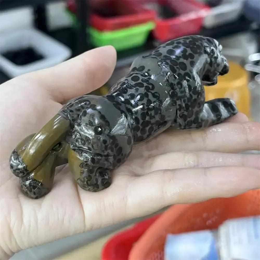 Hand-carved jasper crystal leopard statue with natural spotted patterns for grounding, strength, and primal focus.