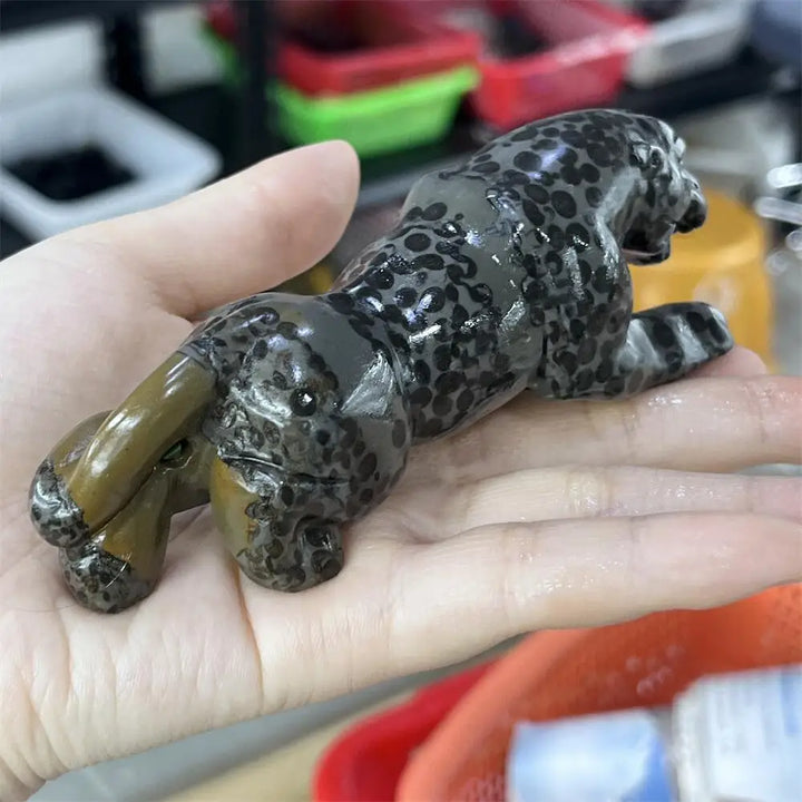 Hand-carved jasper crystal leopard statue with natural spotted patterns for grounding, strength, and primal focus.
