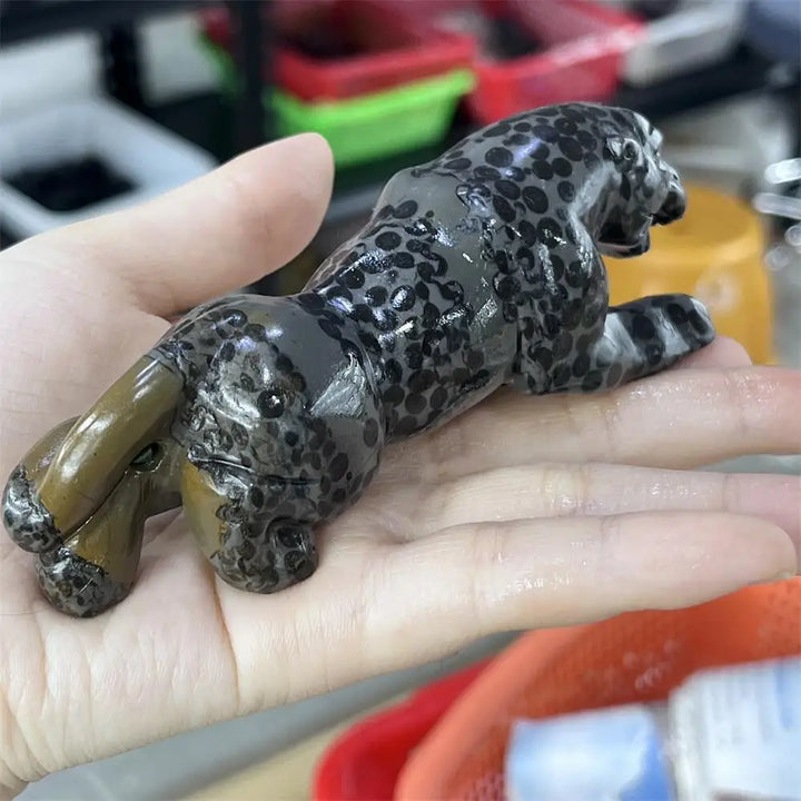 Hand-carved jasper crystal leopard statue with natural spotted patterns for grounding, strength, and primal focus.