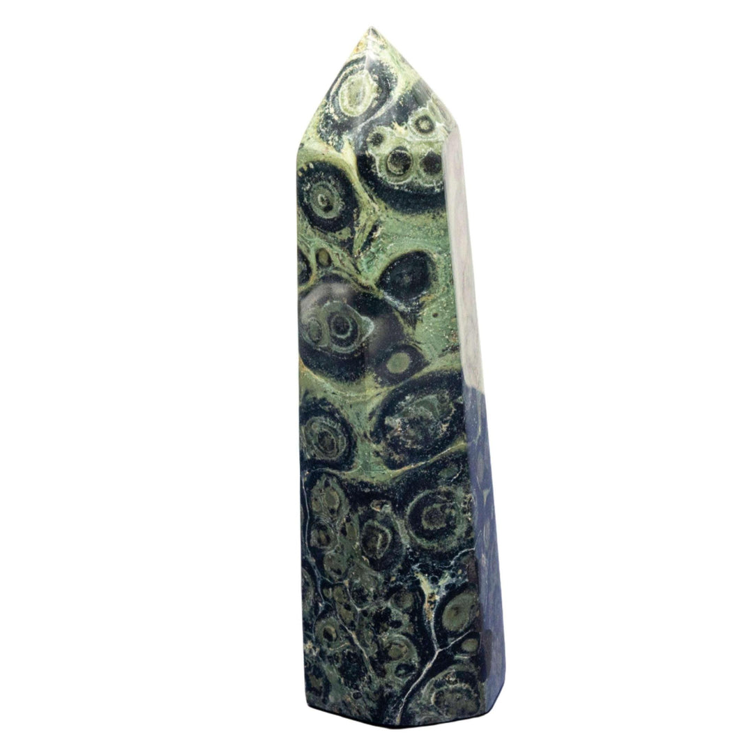 Kambaba Jasper Crystal Tower with swirling green and black fossilized patterns for Root & Heart Chakra grounding.