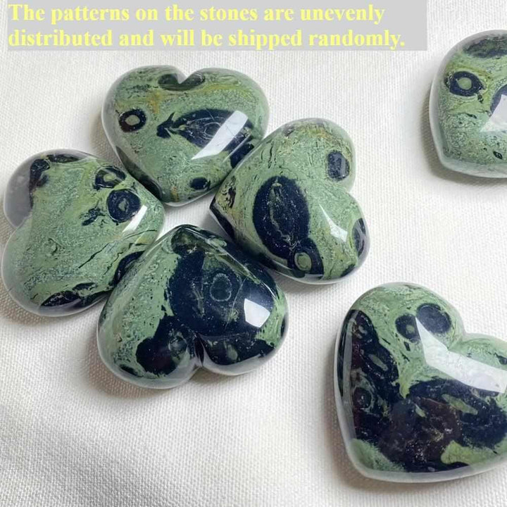 Polished Kambaba Jasper heart with deep green and black orb patterns for grounding and Heart Chakra healing.