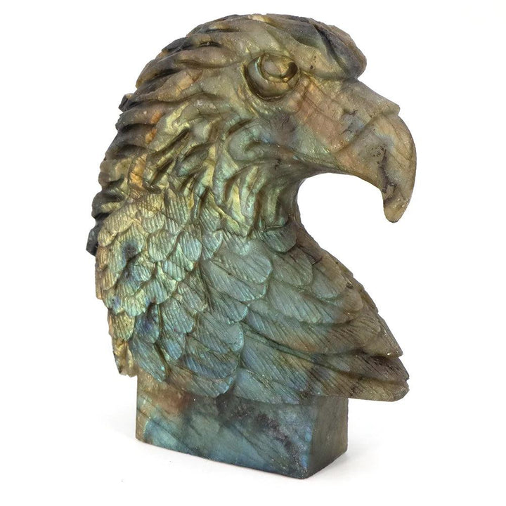 Hand-carved labradorite American Eagle head statue with shifting blue-green flash, symbolizing vision and freedom.