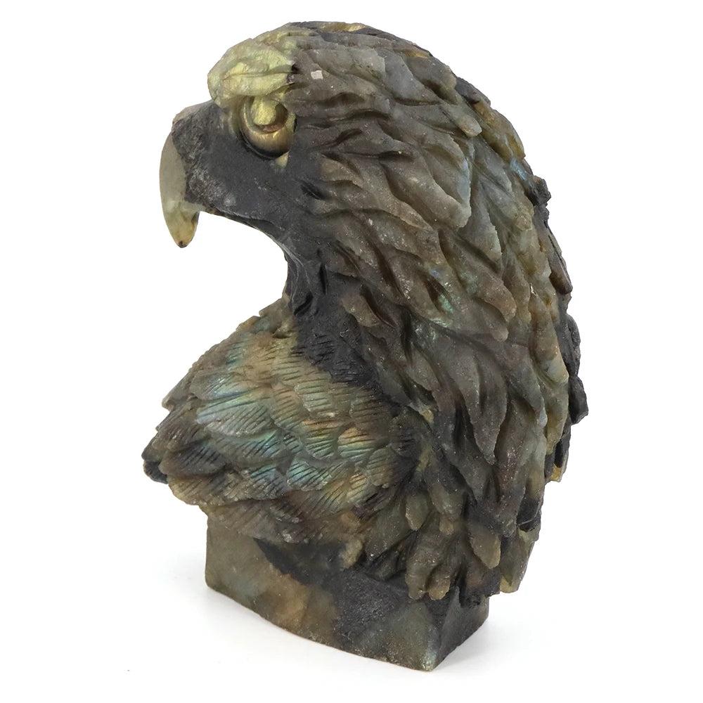 Hand-carved labradorite American eagle head statue with shifting blue-green flash, symbolizing vision and freedom.