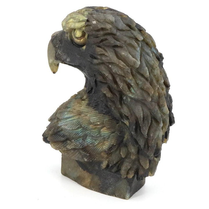 Hand-carved labradorite American eagle head statue with shifting blue-green flash, symbolizing vision and freedom.