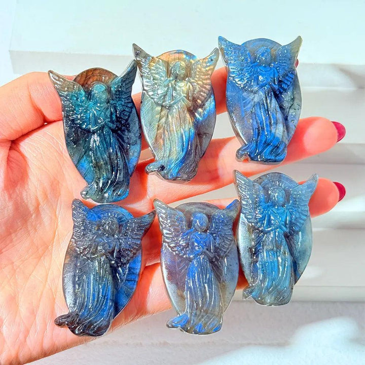 Hand-carved Labradorite angel figurines with iridescent blue flash, perfect for healing home decor and spiritual energy.