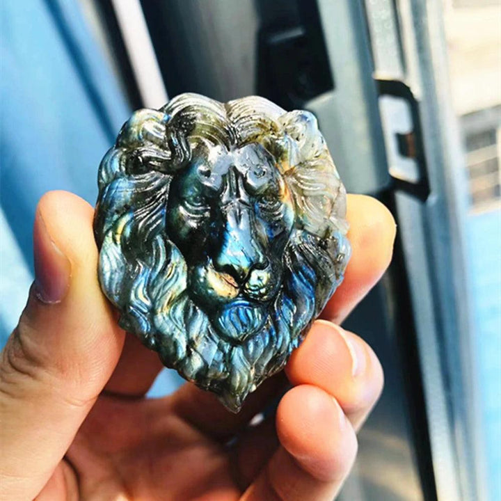 Labradorite Crystal Carved Polished Lion Head Carving, displaying iridescent blues, greens, and golds.