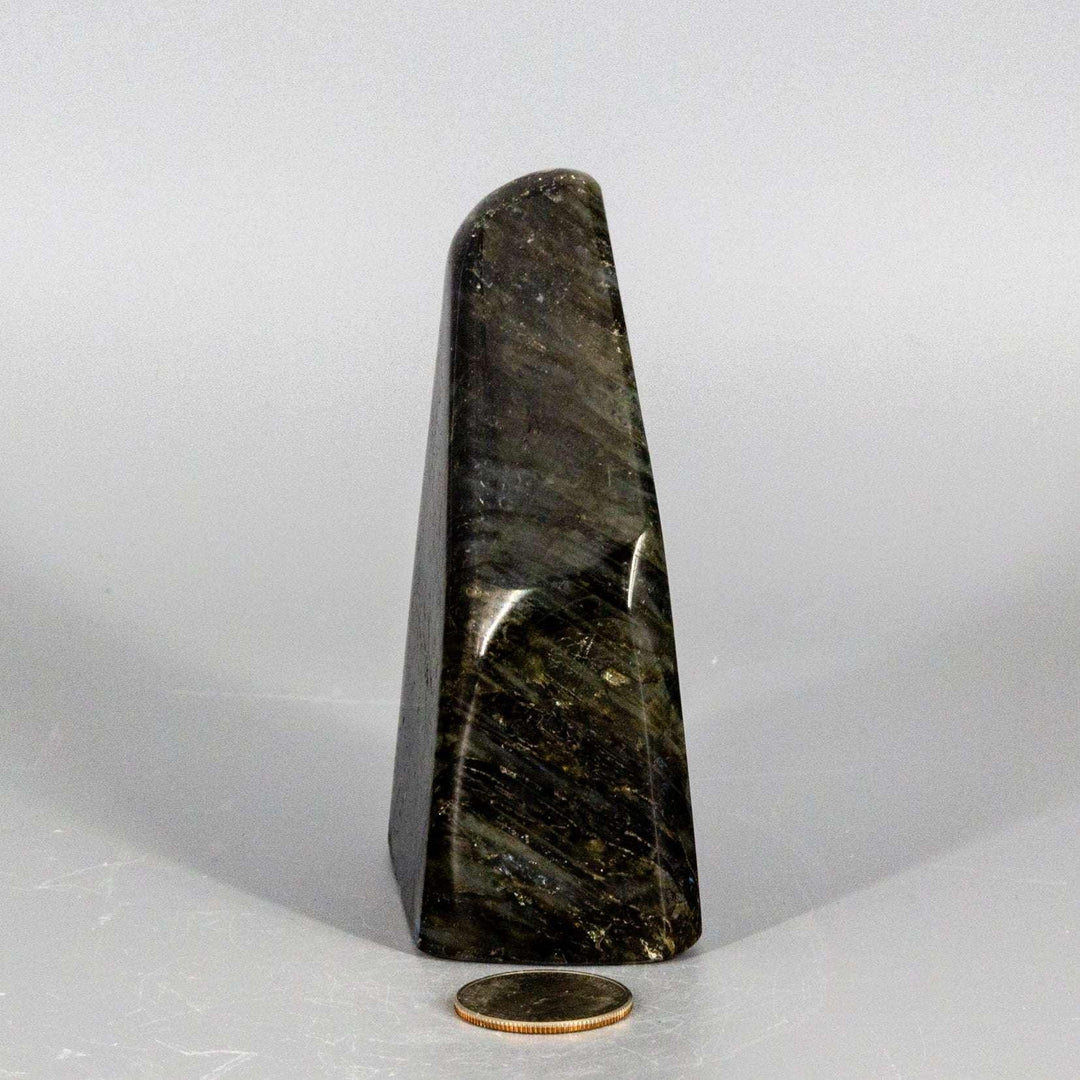 Flashy shimmering Labradorite Freeform Crystal, a substantial dark gray gemstone with electric blue and green flashes.