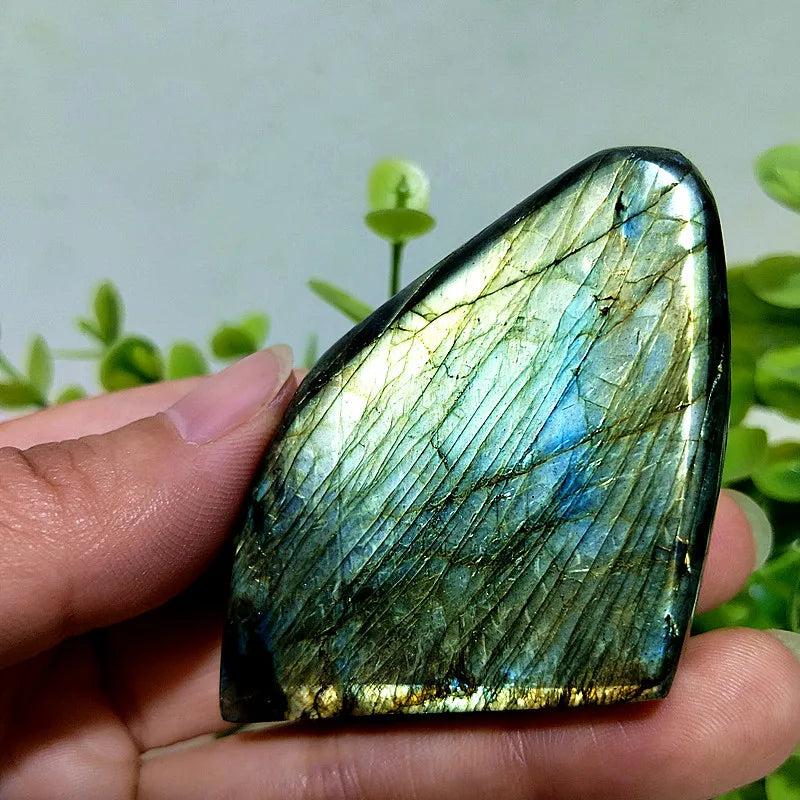 Polished Labradorite freeform crystal displaying vibrant blue and gold labradorescence for protection and intuition.