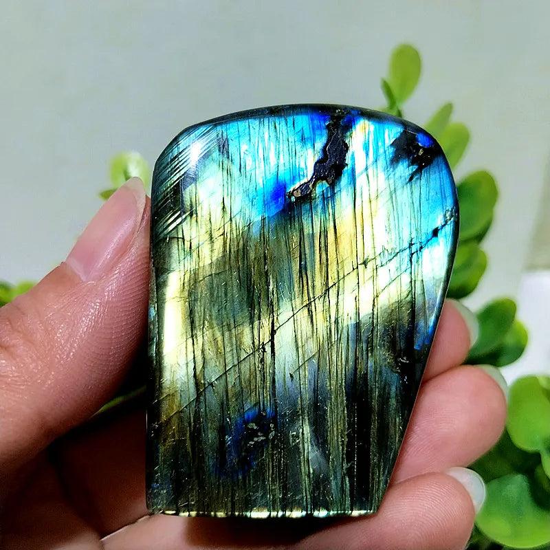Polished Labradorite freeform with vibrant blue and gold labradorescence for intuition and protective energy.