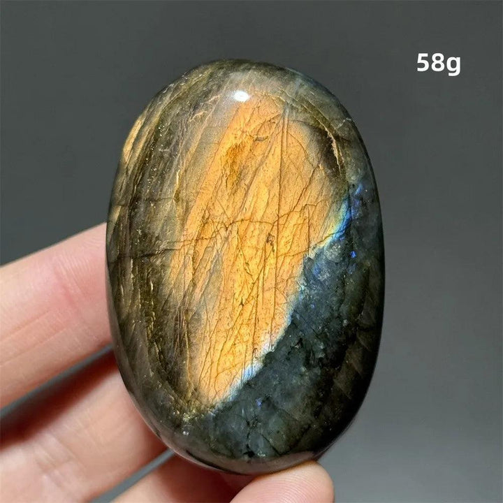 Polished Labradorite crystal palm stone, 58g, with vivid gold, blue, and green labradorescence for protection and growth.