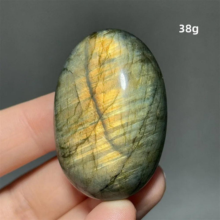 Captivating Labradorite Crystal Polished Palm Stone with vivid blue, gold, and green labradorescence, 38g.