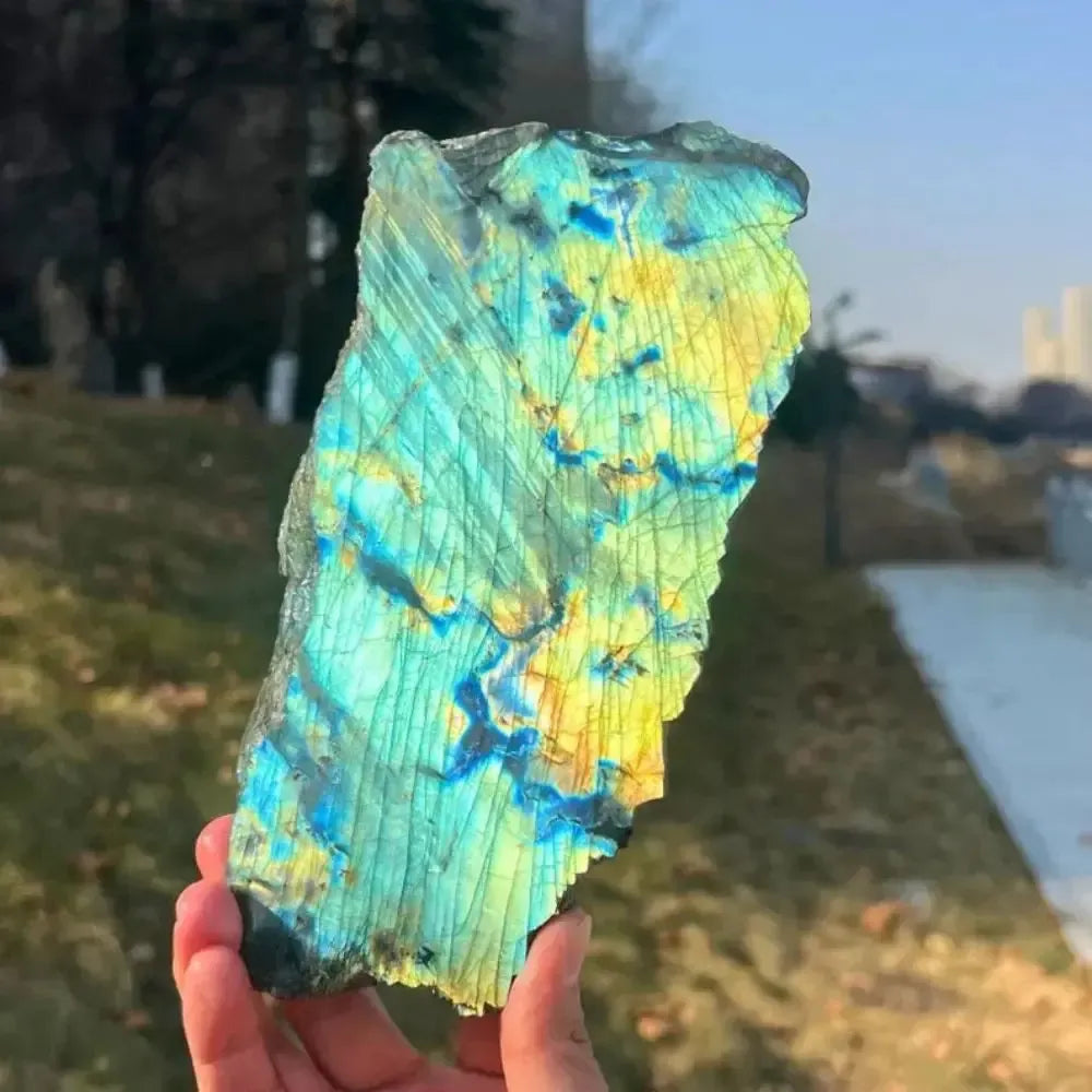 Natural Labradorite crystal rough slice featuring vibrant blue and gold flash for Third Eye and Throat Chakra healing.