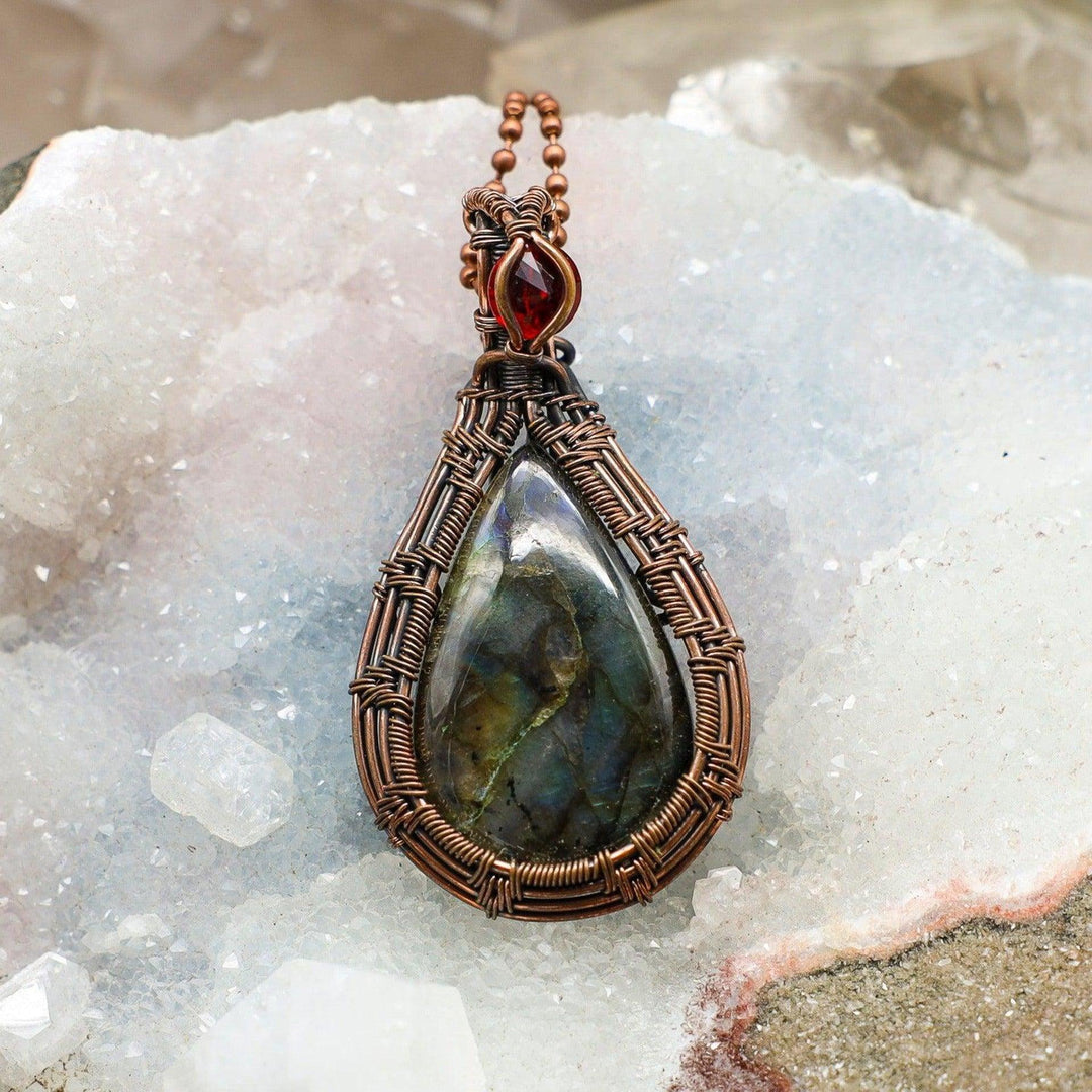 Captivating Labradorite Teardrop Wire Wrap Pendant with iridescent flash, wrapped in healing copper.
