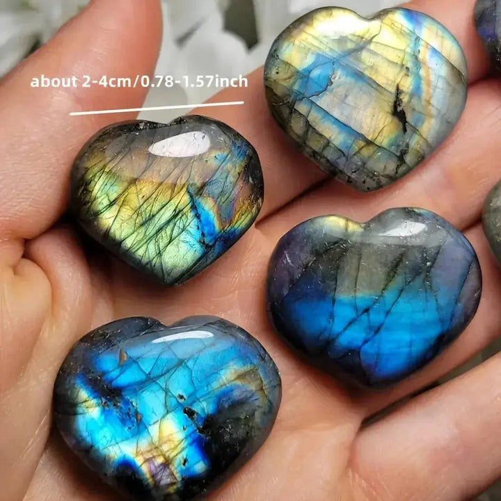Iridescent blue and gold Labradorite heart carvings from Crystal Destiny, enhancing intuition and protection.