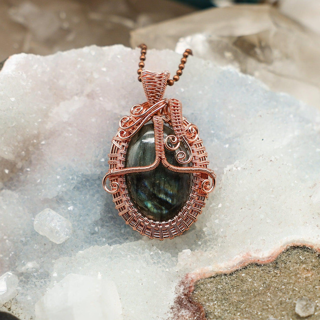Labradorite Oval Wire Wrap Pendant, 2.25" healing copper wire, displaying shifting blues, greens, and golds.
