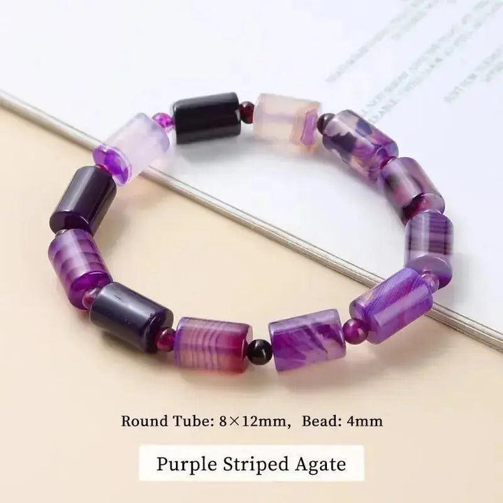 Purple Striped Agate bracelet with polished tube beads, 8x12mm, and 4mm round beads for grounding and balance.