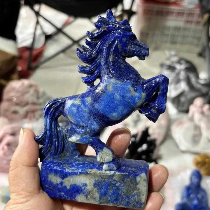 Hand-carved Lapis Lazuli unicorn crystal figurine, a polished blue healing stone perfect for Fengshui home decor and gifts.