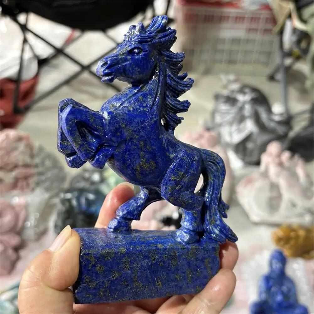Hand-carved Lapis Lazuli unicorn crystal figurine, a deep blue healing stone perfect for reiki and home decor.