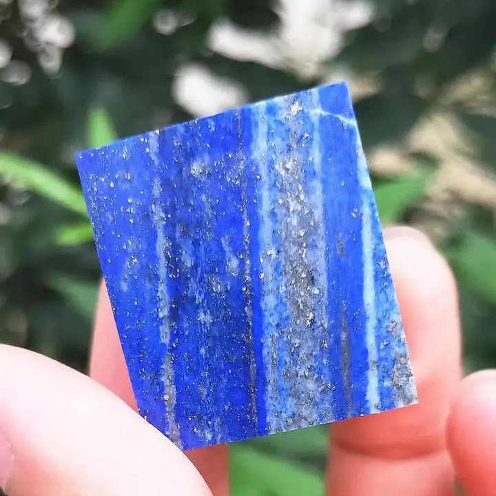 Vibrant blue Lapis Lazuli Crystal Destiny cube, a natural stone paperweight with sparkling pyrite inclusions.