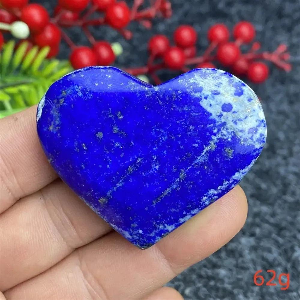 Hand-polished Lapis Lazuli Crystal Heart, deep royal blue with golden pyrite flecks, enhancing intuition and truth.