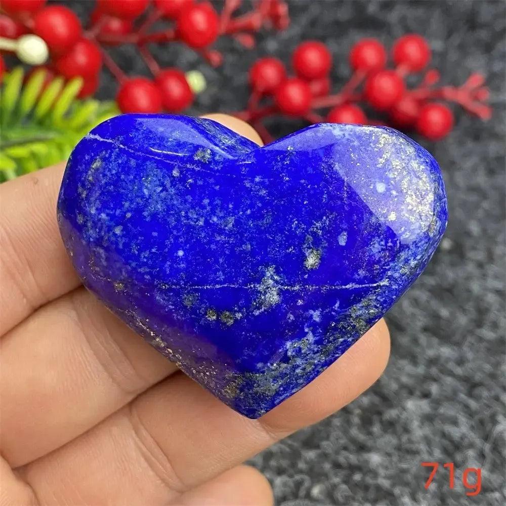 Hand-polished Lapis Lazuli Crystal Heart, deep royal blue with golden pyrite flecks, enhancing intuition and truth.