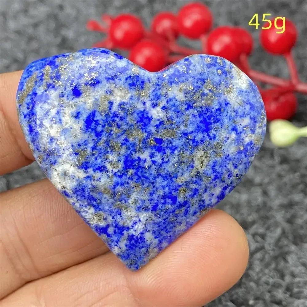 Hand-polished Lapis Lazuli Crystal Heart, deep royal blue with golden pyrite flecks, enhancing intuition and truth.