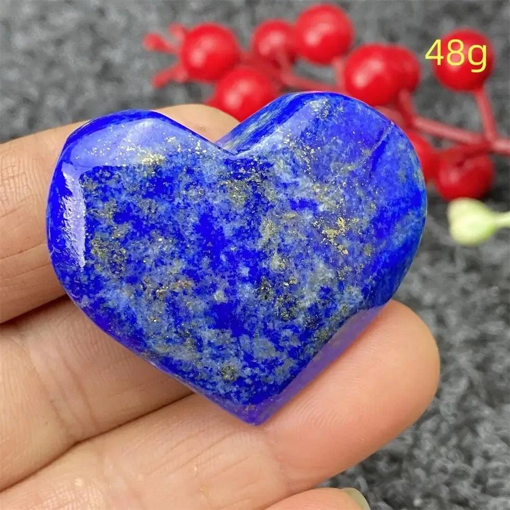Hand-polished Lapis Lazuli Crystal Heart, deep royal blue with golden pyrite flecks, enhancing intuition and truth.