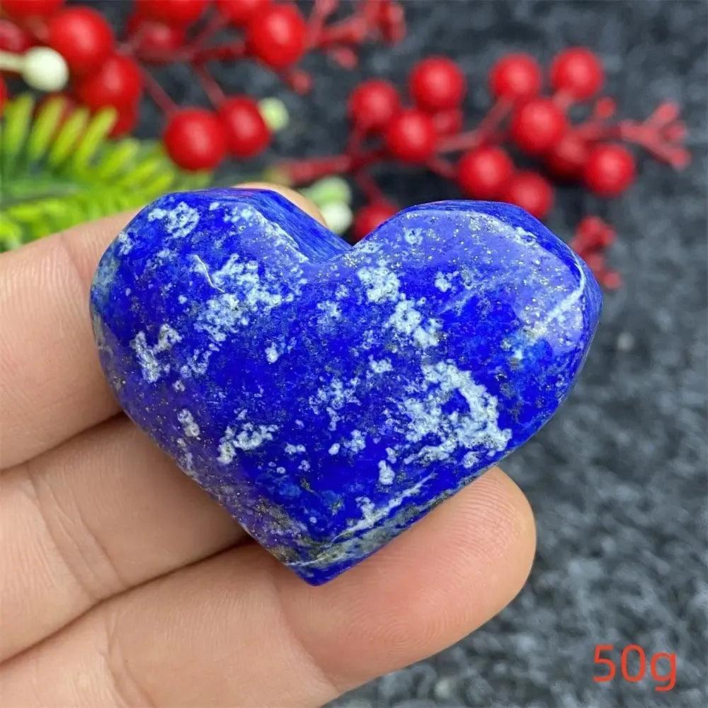 Hand-polished Lapis Lazuli Crystal Heart, deep royal blue with golden pyrite flecks, enhancing intuition and truth.