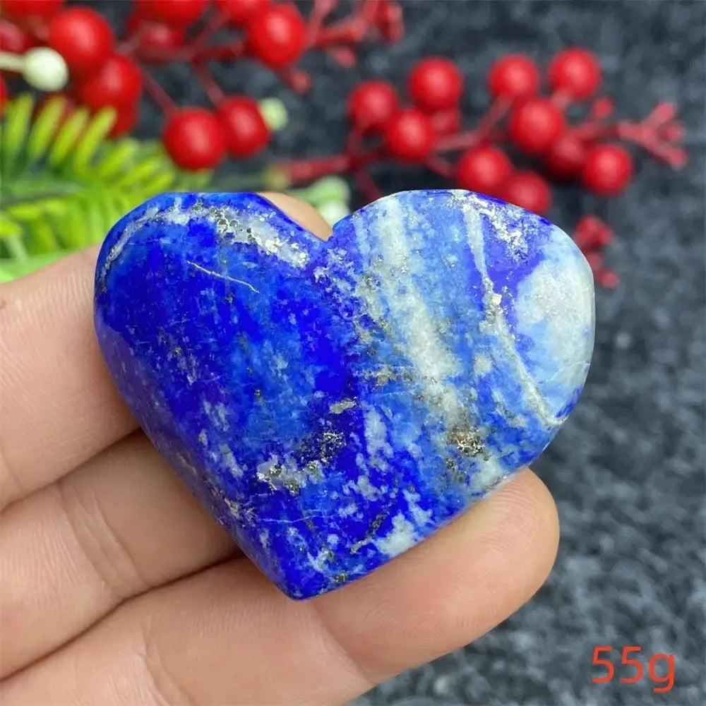 Hand-polished Lapis Lazuli Crystal Heart, deep royal blue with golden pyrite, enhancing intuition and self-awareness.