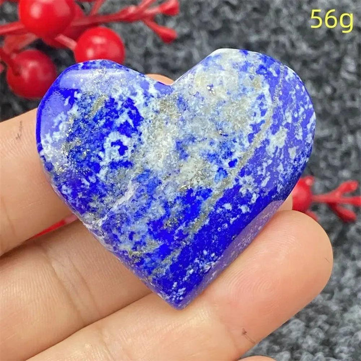 Lapis Lazuli Crystal Heart: Deep royal blue, hand-polished heart with golden pyrite flecks for wisdom and intuition.