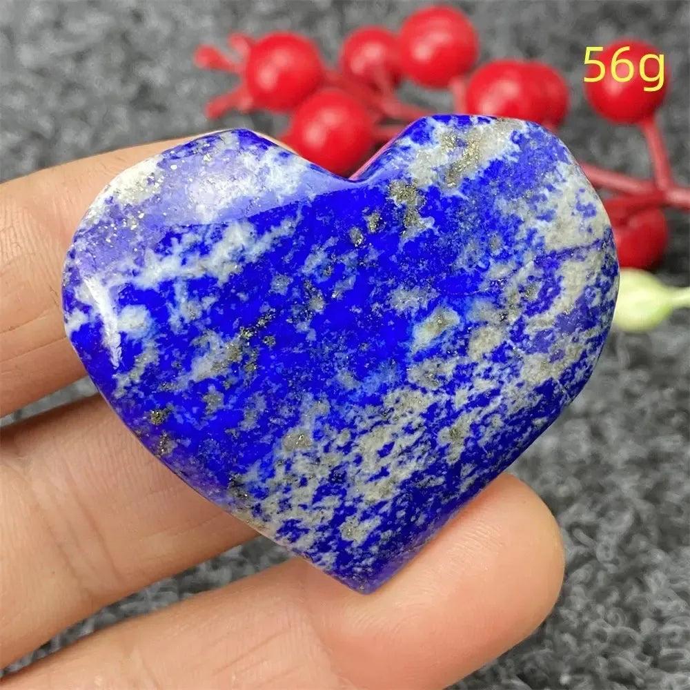 Hand-polished Lapis Lazuli Crystal Heart, deep royal blue with golden pyrite flecks, enhancing intuition and truth.