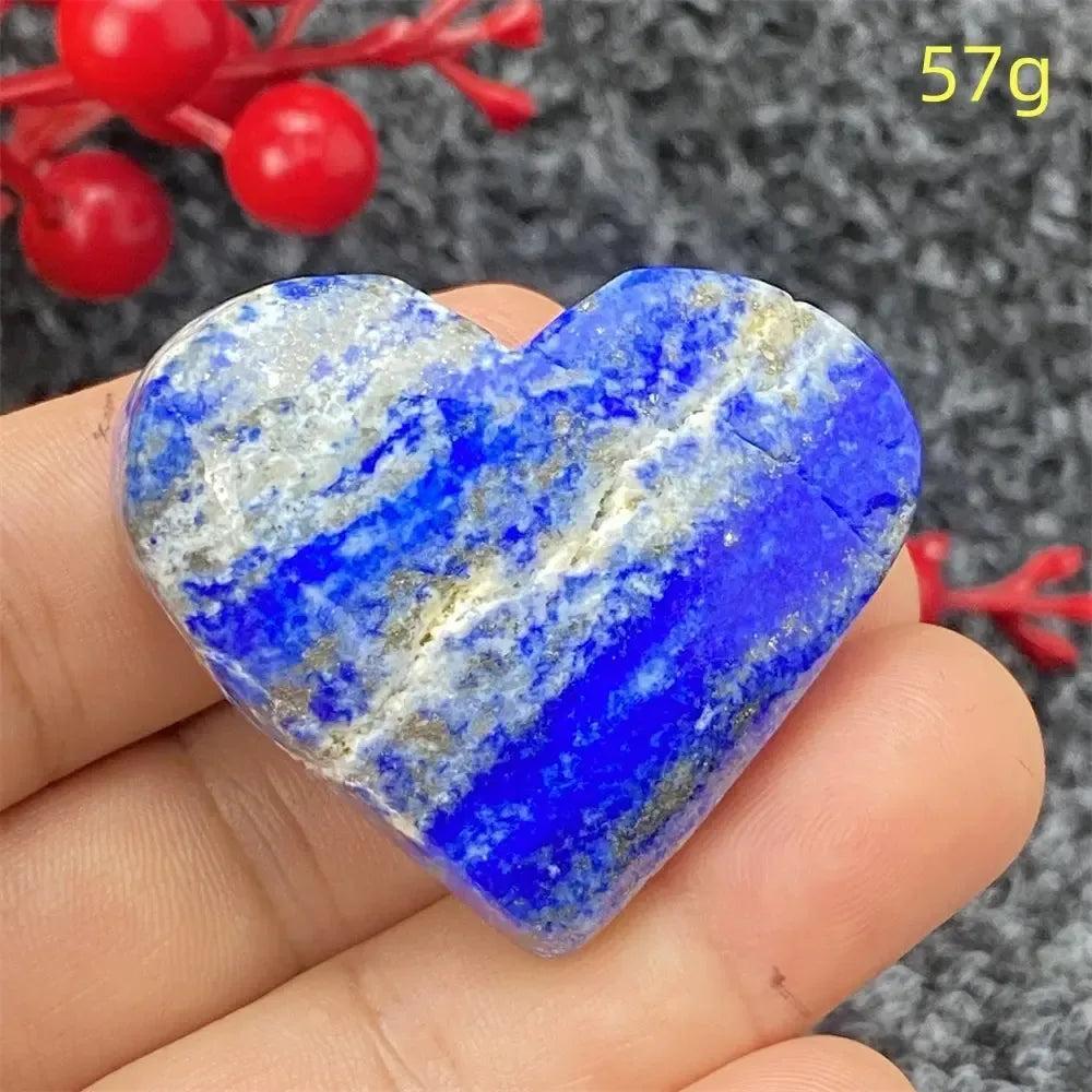 Hand-polished Lapis Lazuli Crystal Heart, deep royal blue with golden pyrite, enhancing intuition and self-awareness.