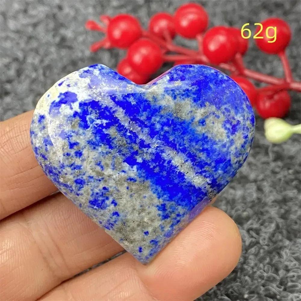 Hand-polished Lapis Lazuli Crystal Heart, deep royal blue with golden pyrite, enhancing intuition and self-awareness.