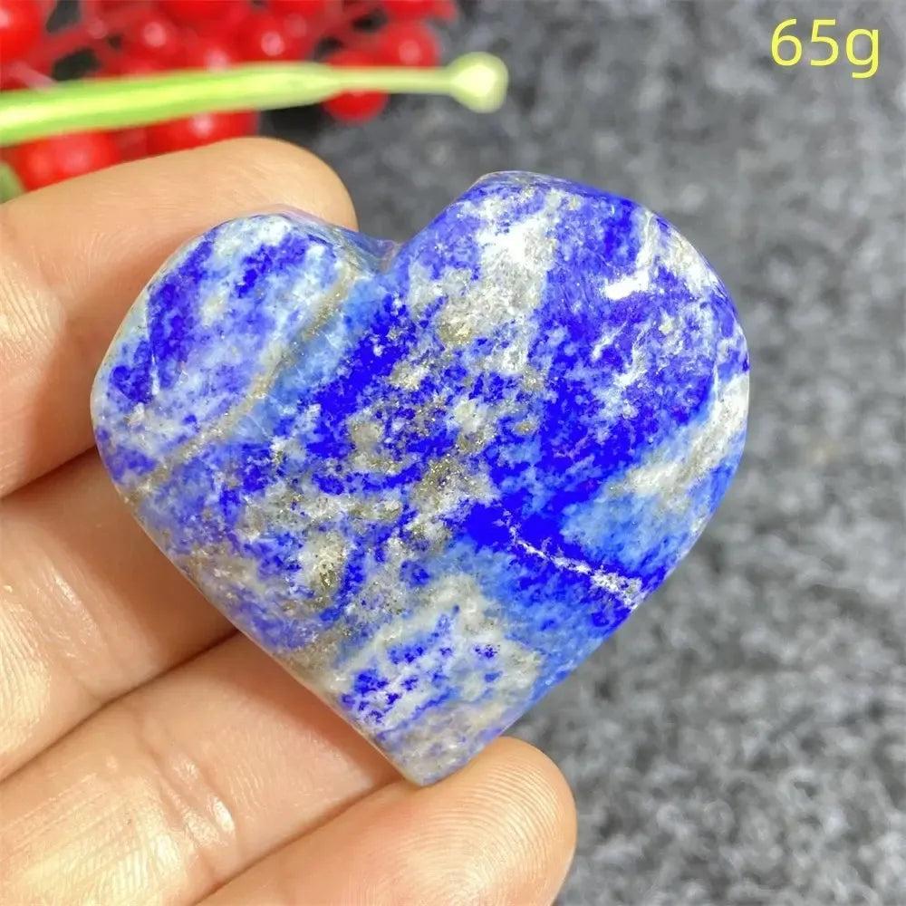 Hand-polished Lapis Lazuli Crystal Heart, deep royal blue with golden pyrite flecks, enhancing intuition and truth.