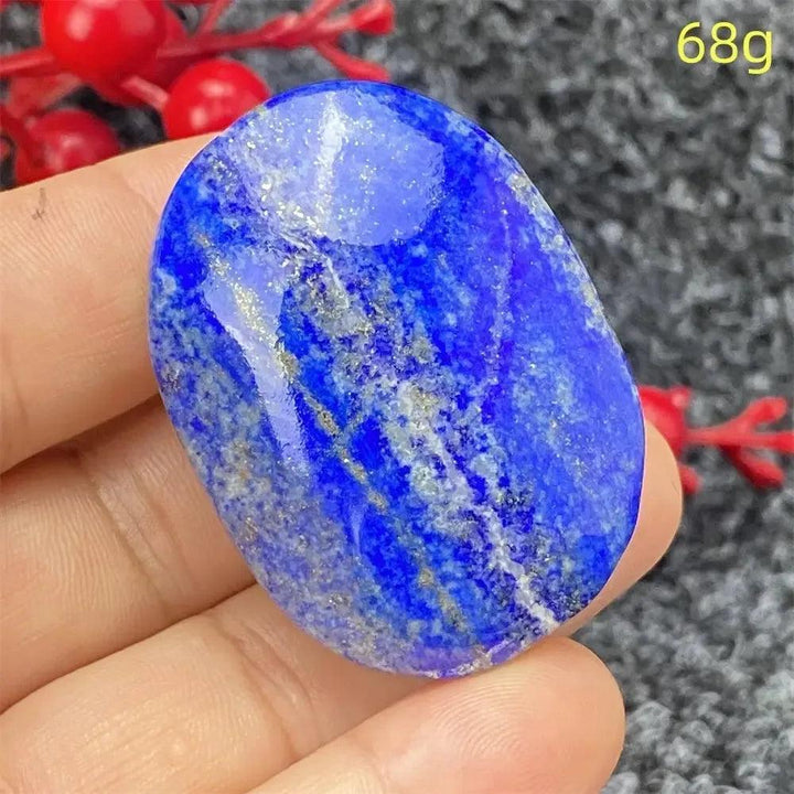 Hand-polished Lapis Lazuli Crystal Heart, deep royal blue with golden pyrite flecks, enhancing intuition and truth.
