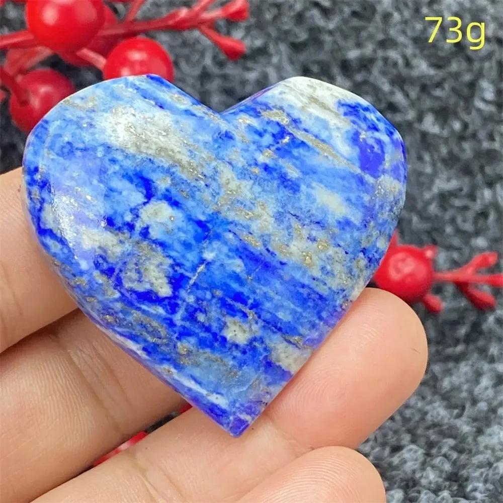 Hand-polished Lapis Lazuli Crystal Heart, deep royal blue with golden pyrite, enhancing intuition and self-awareness.