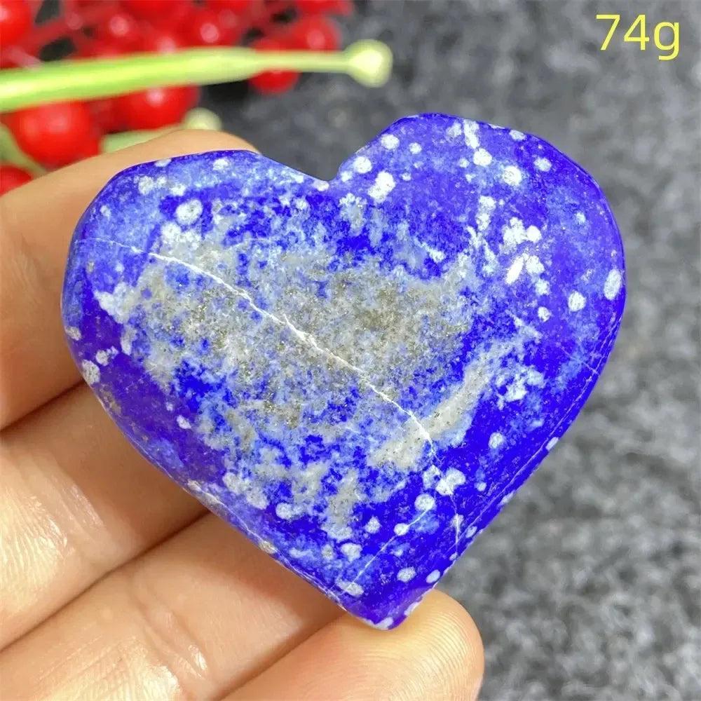 Hand-polished Lapis Lazuli Crystal Heart, deep royal blue with golden pyrite flecks, enhancing intuition and truth.