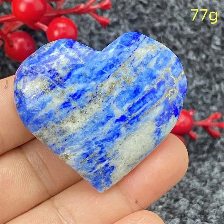 Lapis Lazuli Crystal Heart: Deep royal blue, hand-polished heart with golden pyrite flecks, enhancing intuition.
