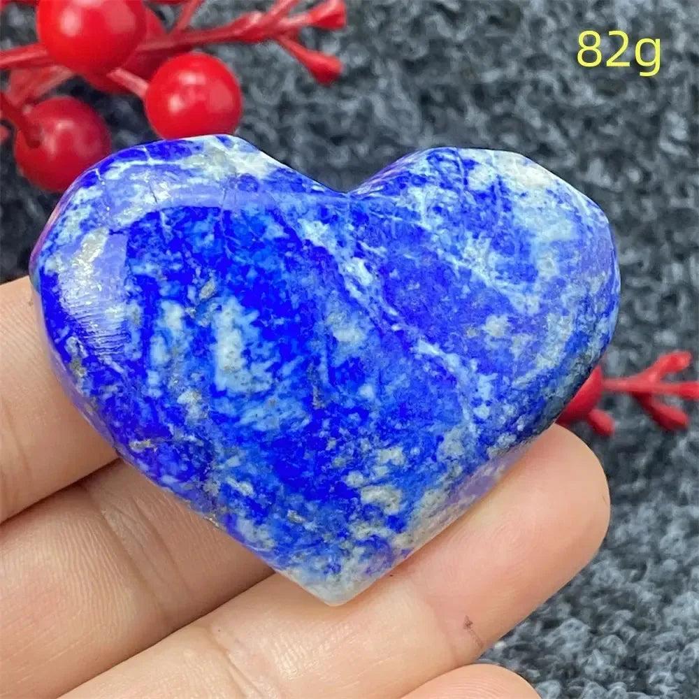 Deep blue Lapis Lazuli Crystal Heart, hand-polished with golden pyrite flecks, radiating ancient wisdom and spiritual power.
