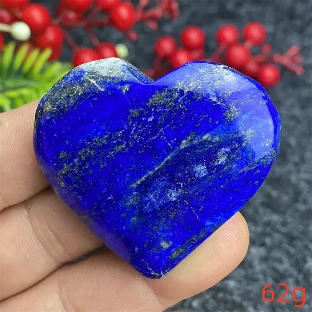 Hand-polished Lapis Lazuli Crystal Heart, deep royal blue with golden pyrite, radiating ancient wisdom and spiritual power.