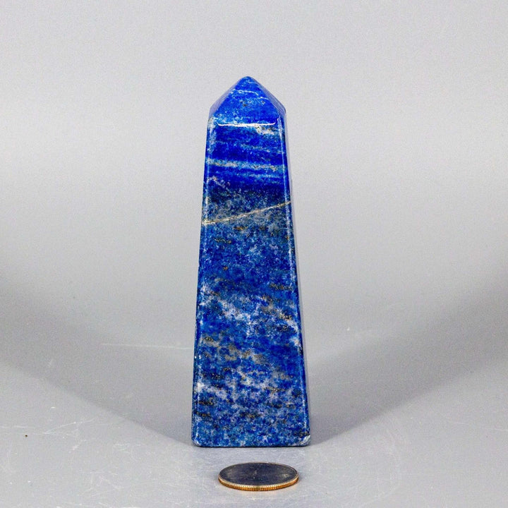 Lapis Lazuli Obelisk Tower, 5.5-inch deep celestial blue with gold pyrite flecks, commanding attention.