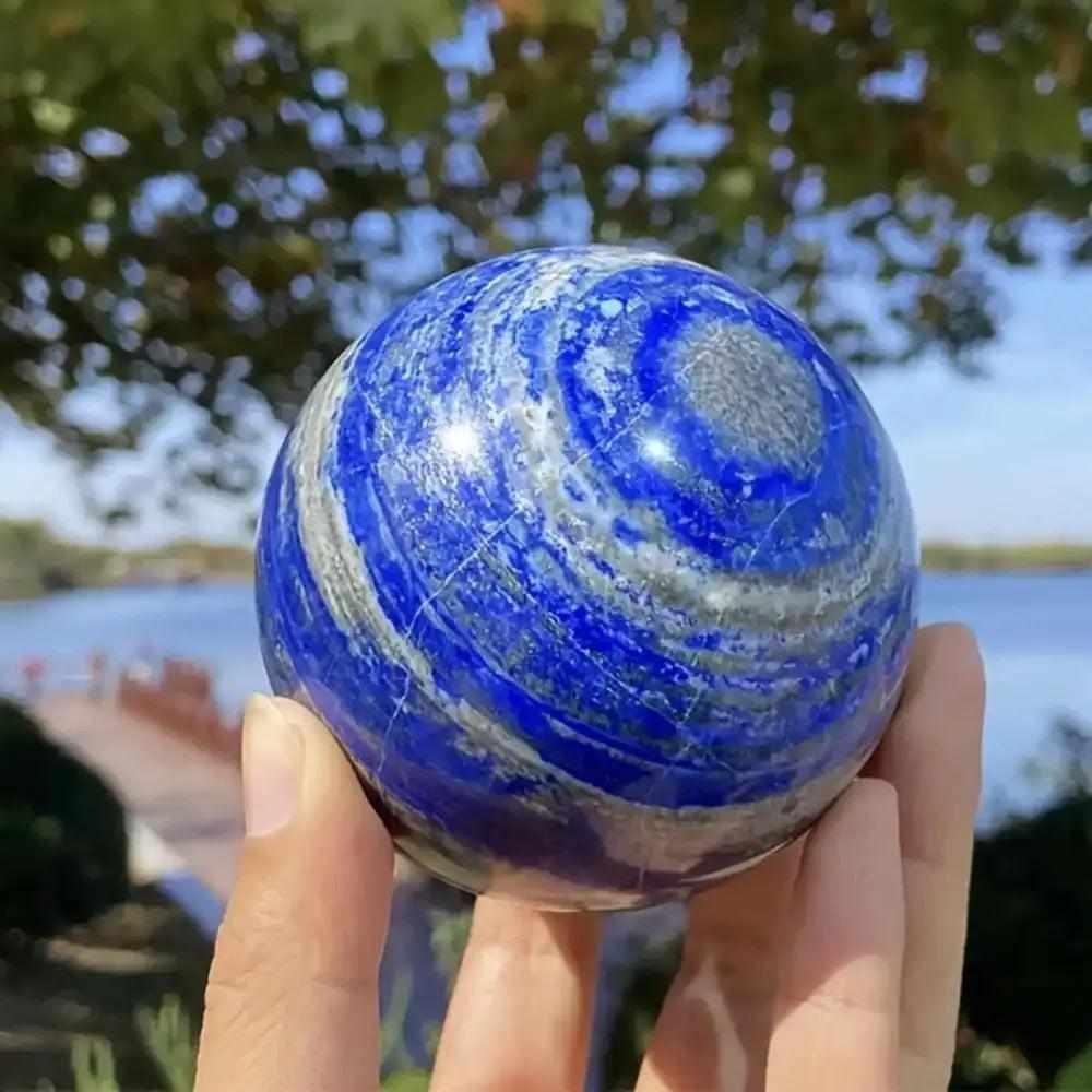 Polished Lapis Lazuli crystal sphere in deep royal blue with natural gold and white flecks for wisdom and intuition.
