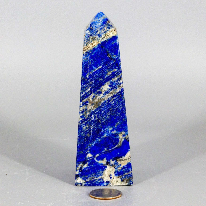 Large Lapis Lazuli Obelisk Tower, deep celestial blue with gold pyrite flecks, polished to enhance wisdom.