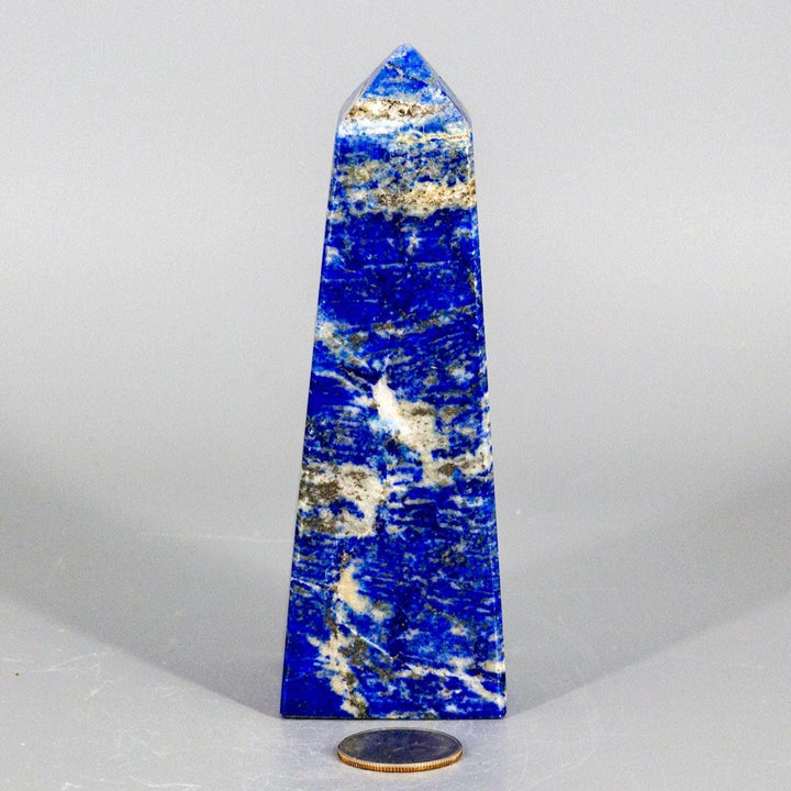 Large Lapis Lazuli Obelisk Tower, deep celestial blue with gold pyrite flecks, polished to enhance wisdom.