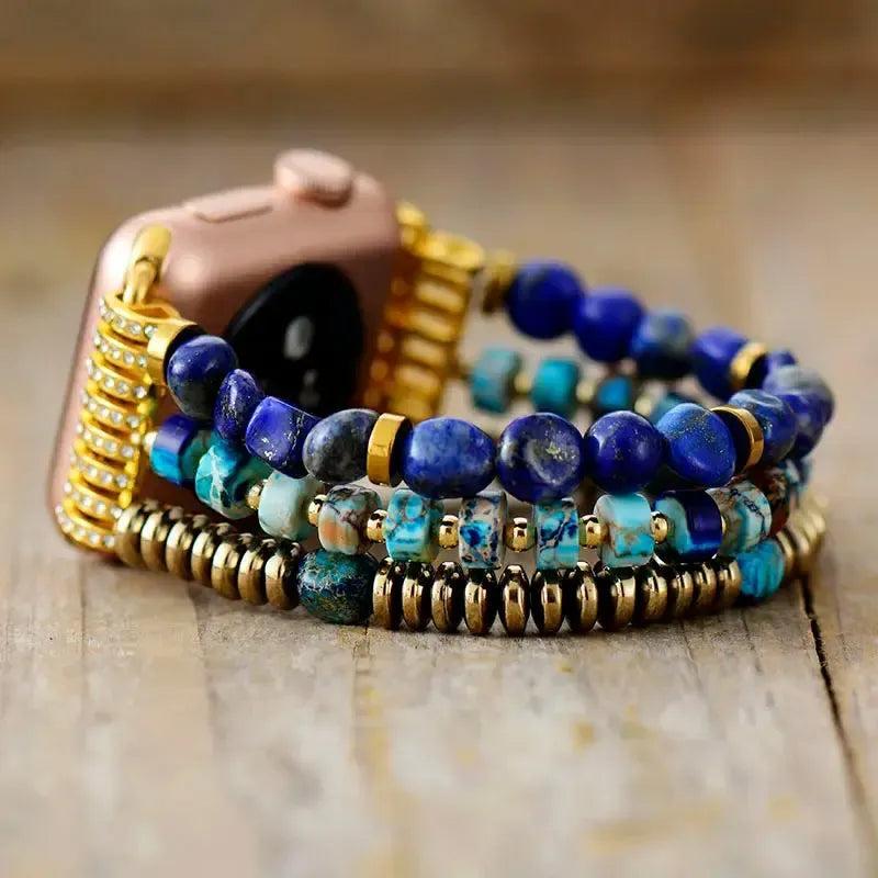 Lapis Lazuli Jasper Beaded Apple iWatch Band with celestial blue and earthy tones, gold accents, and a rose gold watch.
