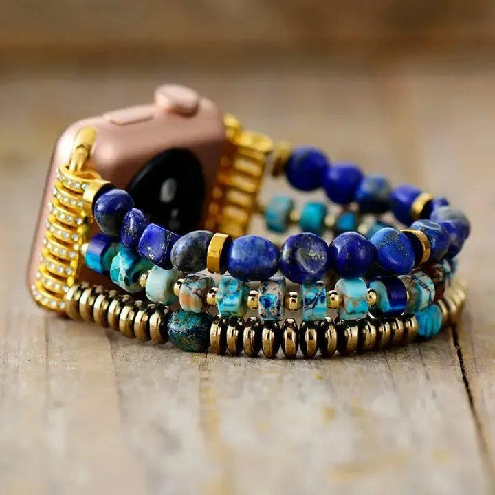 Lapis Lazuli Jasper Beaded Apple iWatch Band with celestial blue and earthy tones, gold accents, and a rose gold watch.