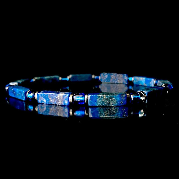 Lapis Lazuli square bead bracelet on elastic cord, featuring deep blue stones for Throat Chakra wisdom and expression.